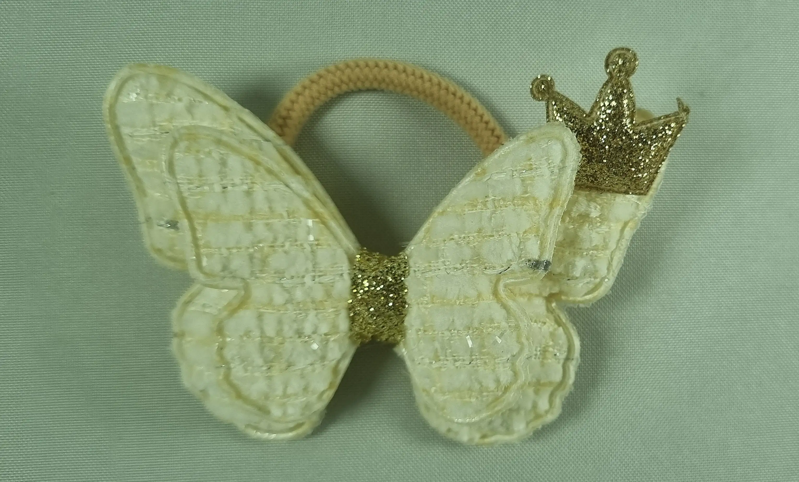 کش مو پروانه تاجدار