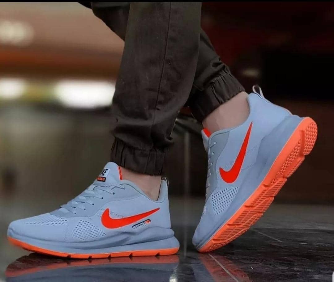 کتونی نایک رانینگ مدل ورزشی و راحتی مردانه رنگ طوسی نارنجی