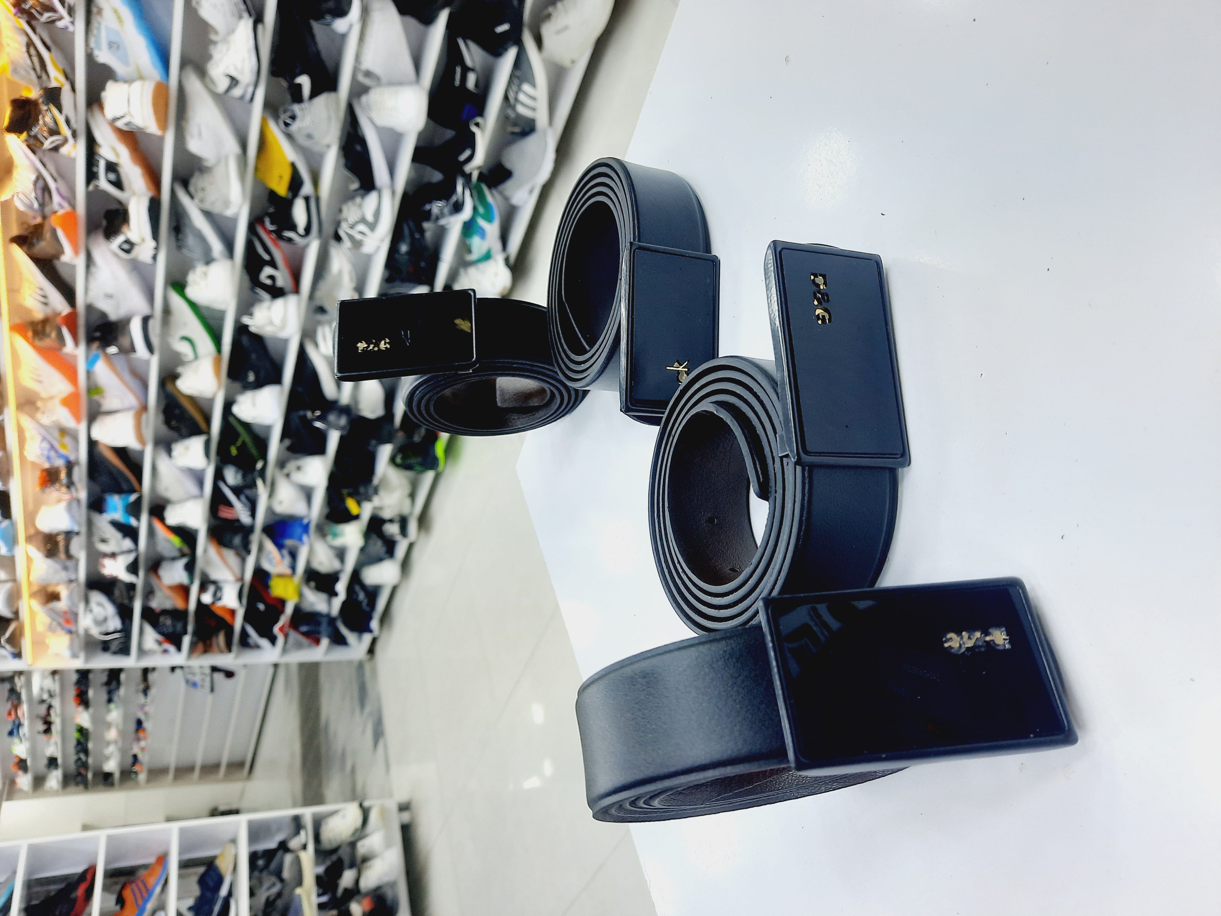 کمربند مردانه سگگ پلاکی رنگ مشکی و عسلی حراج