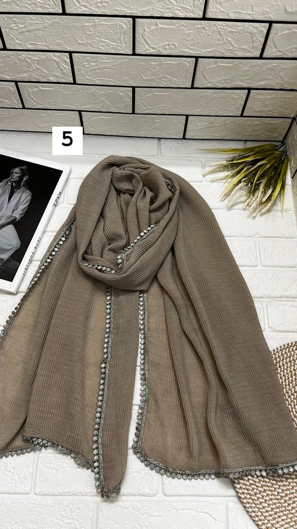 شال پلیسه دور عدسی