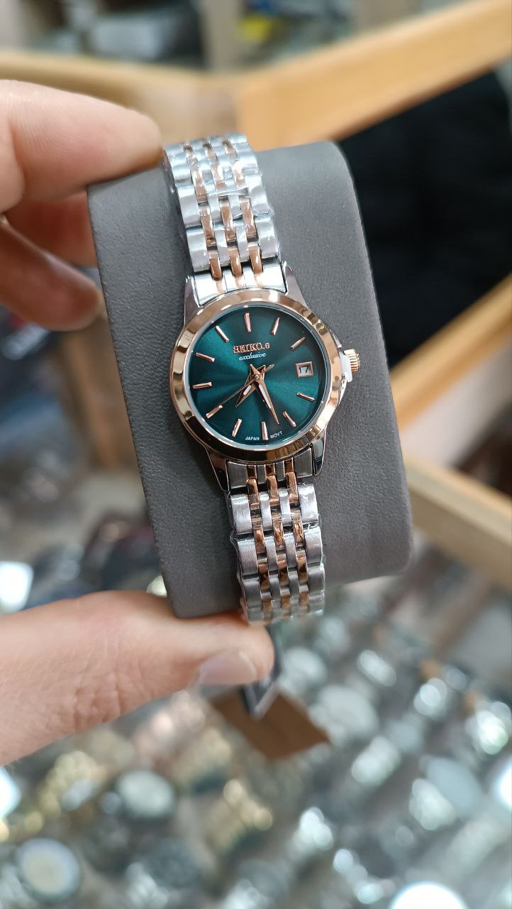ساعت مچی زنانه سیکو  Seiko 3157 صفحه زرشکی