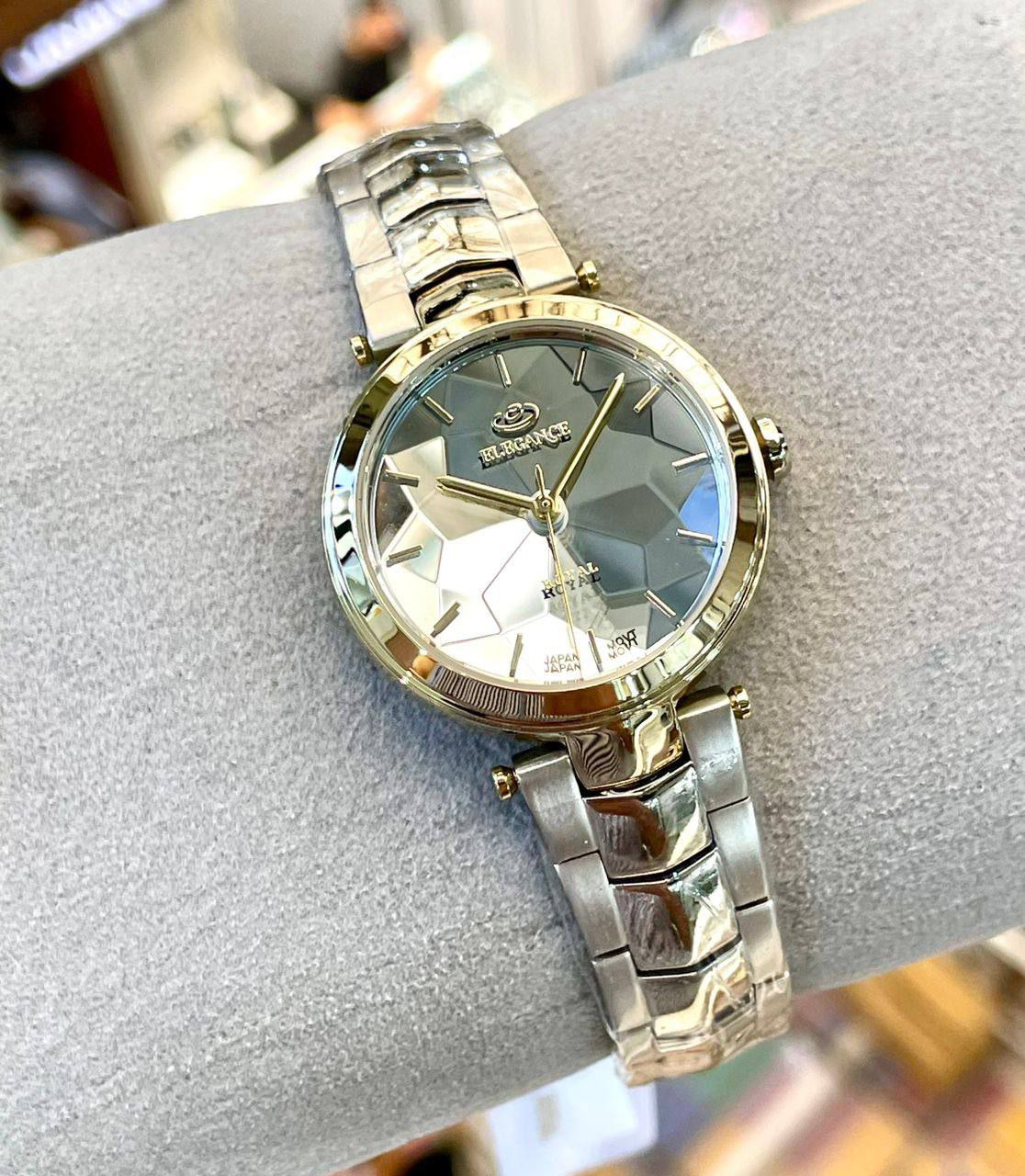 ساعت الگانس زنانه شیشه منشوری / ساده بند استیل رنگ سیلور صفحه